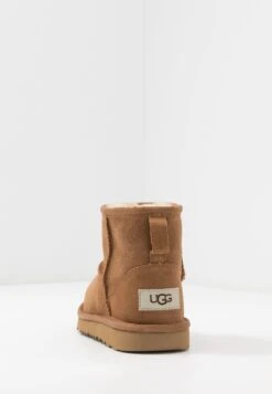 Ugg Classic Mini Ii Unisex - Classic Ankle Boots - Chestnut 18 Ugg Classic Mini Ii Unisex - Classic Ankle Boots - Chestnut -Fashion Clothing Specialty Store 0e3da423e9d14b82bc91c641651afaac