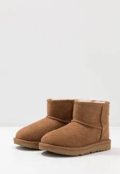Ugg Classic Mini Ii Unisex - Classic Ankle Boots - Chestnut 17 Ugg Classic Mini Ii Unisex - Classic Ankle Boots - Chestnut -Fashion Clothing Specialty Store 79a79b57e9cc499a9c07601f4e0e39da