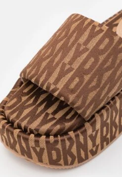 DKNY Vyra Platform Slide - Heeled Mules - Saddle/New Nude 15 DKNY Vyra Platform Slide - Heeled Mules - Saddle/New Nude -Fashion Clothing Specialty Store 8f625af3f2444b59ba2f975af8c296bd