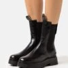 AllSaints Amber Boot - Platform Ankle Boots - Black 1 AllSaints Amber Boot - Platform Ankle Boots - Black -Fashion Clothing Specialty Store 940d50aafda34020a9ae6ed59e9fb58a