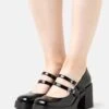 Call It Spring Monroe - Platform Heels - Black 2 Call It Spring Monroe - Platform Heels - Black -Fashion Clothing Specialty Store 958705db34da40ffb3990315c28a9422