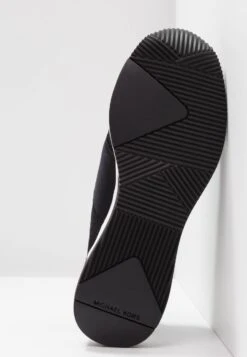 MICHAEL Michael Kors Felix Trainer - Slip-Ons - Black -Fashion Clothing Specialty Store 977369cabfcb4350a76b21fc0ed2ca82