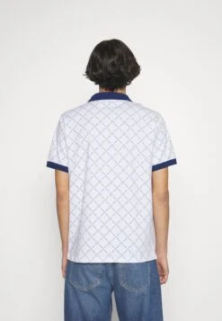 Ellesse Couramento - Polo Shirt - White 13 Ellesse Couramento - Polo Shirt - White -Fashion Clothing Specialty Store ad30f182c9a148df8bfabf07a150a28a