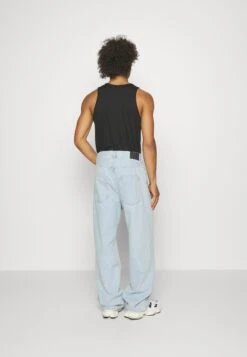 YOURTURN Baggy Jeans Unisex - Relaxed Fit Jeans - Light Blue Denim -Fashion Clothing Specialty Store b5a3a98eb1c846b6896614b68e538ab7