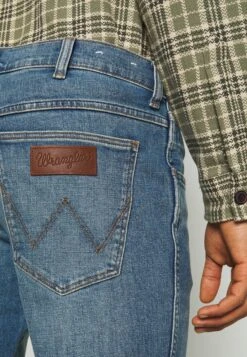Wrangler Straight Leg Jeans - Blue Fever -Fashion Clothing Specialty Store e7b31c10e62145b6a18a2ceac63d087d
