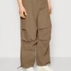 YOURTURN Unisex - Trousers - Brown
