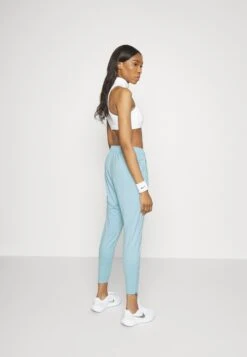 Nike Performance Essential Novelty Pant - Tracksuit Bottoms - Ocean Bliss/Silver -Fashion Clothing Specialty Store ffa0419c71c6404dbf20e33c46703c6e